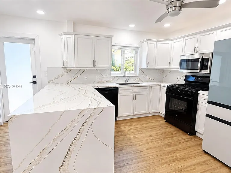 8819 Dickens Ave — Photo 3