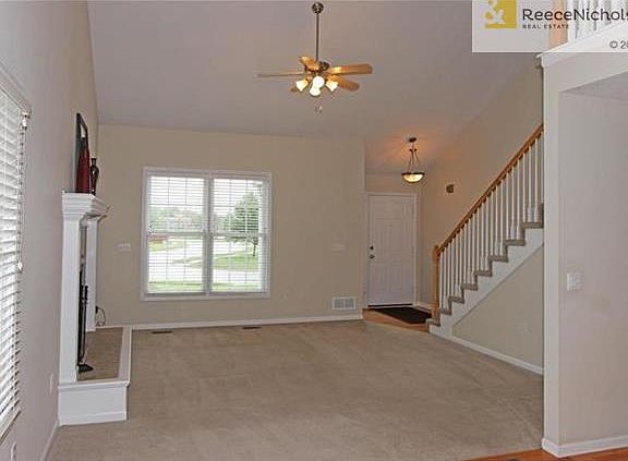 High Vaulted Ceilings and Wood Blinds throughout home!