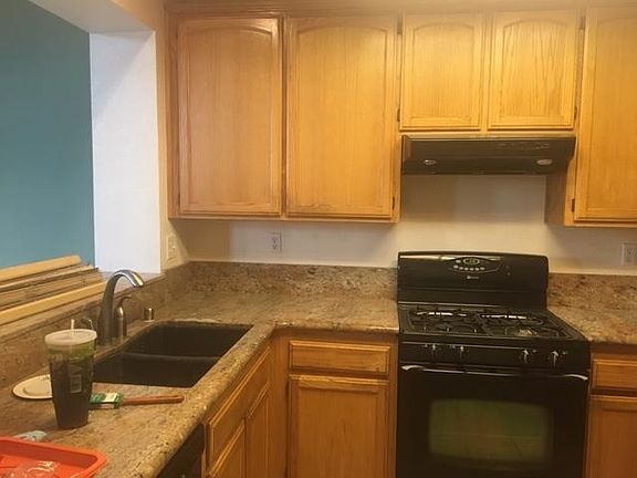 Kitchen granite black appliances includes Fridge new stove and new light