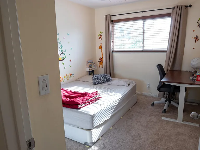 Bedroom 3 with carpets before which have now been replaced with wooden flooring