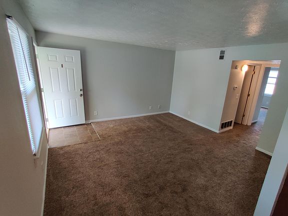 Living room adjacent to breakfast nook.
