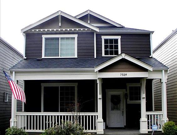 You'll love relaxing in the cool summer breeze on the sitting porch!