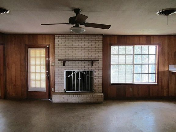 view of den/dining from front door