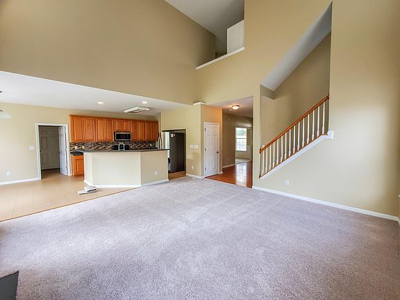 Great room, two story living room open to kitchen, breakfast room