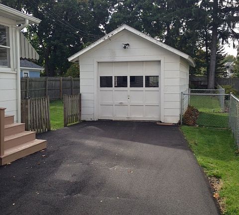 Driveway view of garage