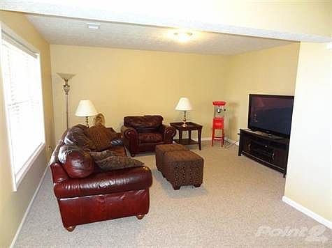 Family Room in the Basement with Large Windows.