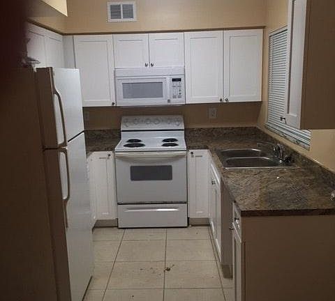2nd image of 10902 N Arden Ave