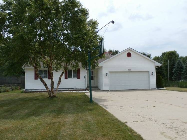 Location, location, location.  Minutes from town,there's nothing left to do in this house, but move right in.  This three bedroom, three bath open floor plan home has all the bells and whistles, with all the appliances that stay, including the front loading washer and dryer.  Updates include a new roof that's less than 6 months old, new black coated vinyl fencing, new deck and patio.  The basement remodel in 2013 includes a 3rd bath in the basement, egress window, and family room. Call for your personal showing today!