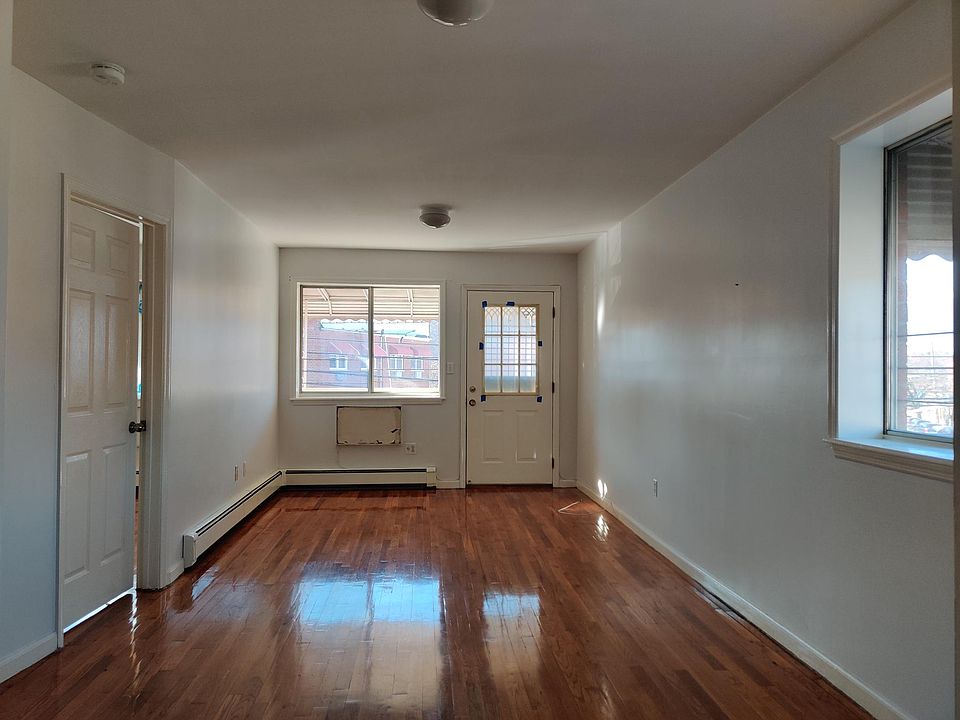 Living Room with Door to Bedroom 1 and Balcony
