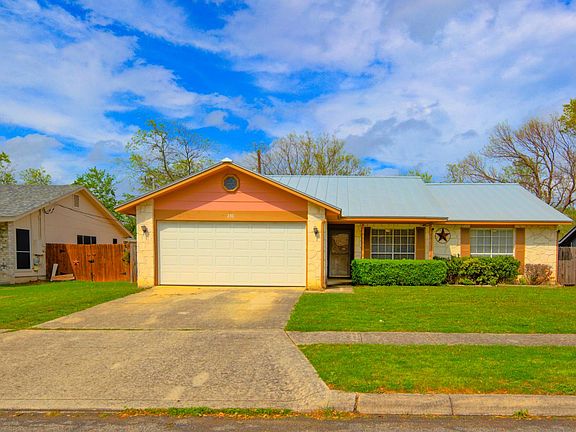White Stone, Standing Seam Metal Roof, Large Driveway & on a Quiet St.
