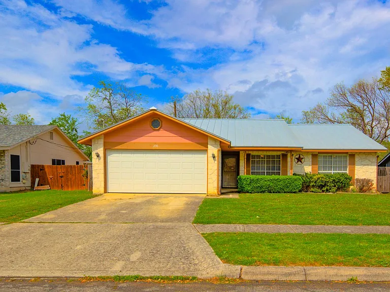 White Stone, Standing Seam Metal Roof, Large Driveway & on a Quiet St.