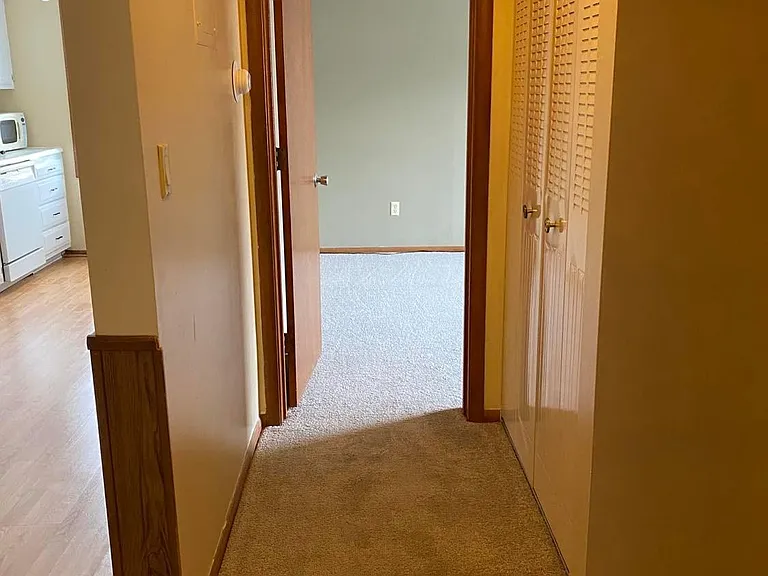 Hallway between bedrooms and near bathroom