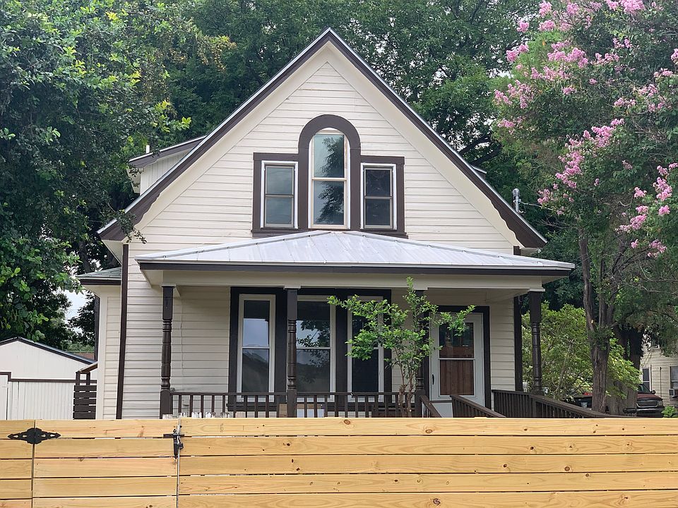 Front of house with new front fence