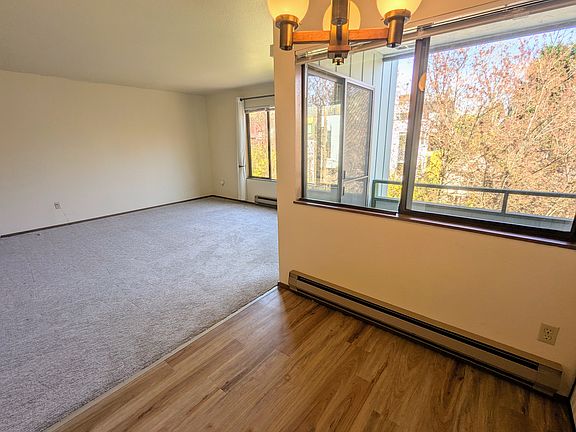 Dining room, living room, looking out over the balcony