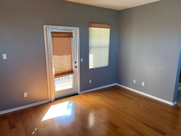 master bedroom and balcony over driveway