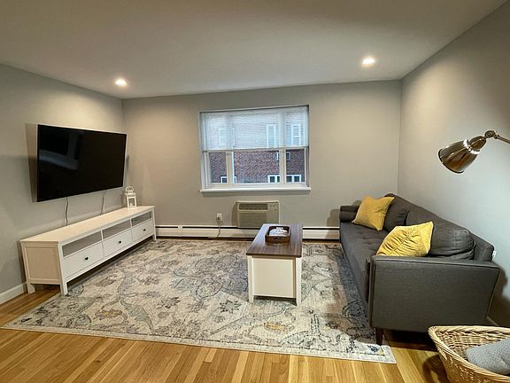 Spacious living room with large window
