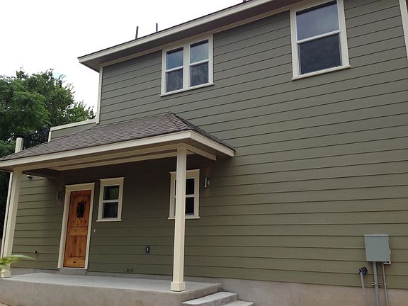 Side view of main entry to home which is keyless entry.