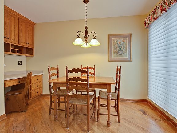 Sunny casual eating area. Also, a planning desk nook.