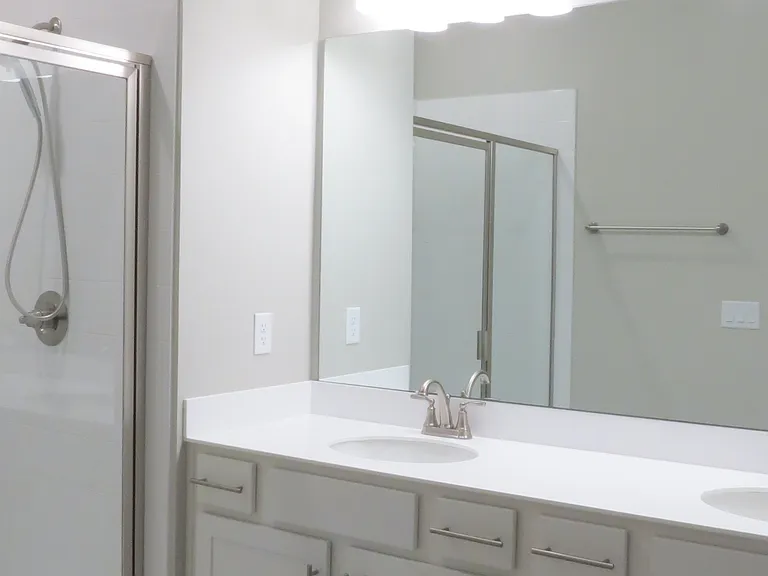 Nice white vanities with lots of storage