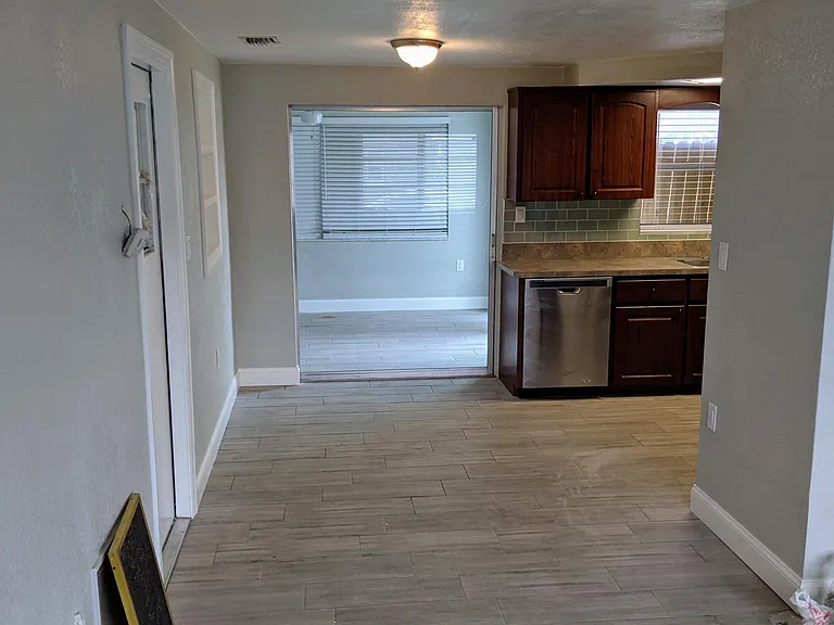 View from main living room going into the kitchen