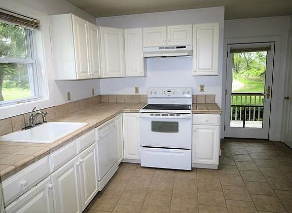 The home boasts a large, bright kitchen with newer appliance