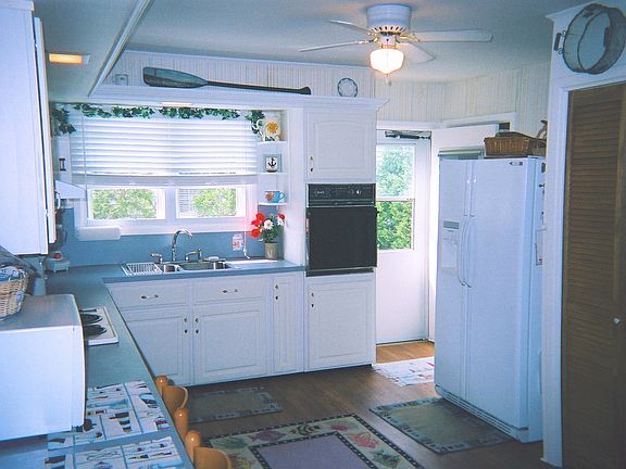 New Roomy Fridge Features Automatic Ice & Chilled Water!