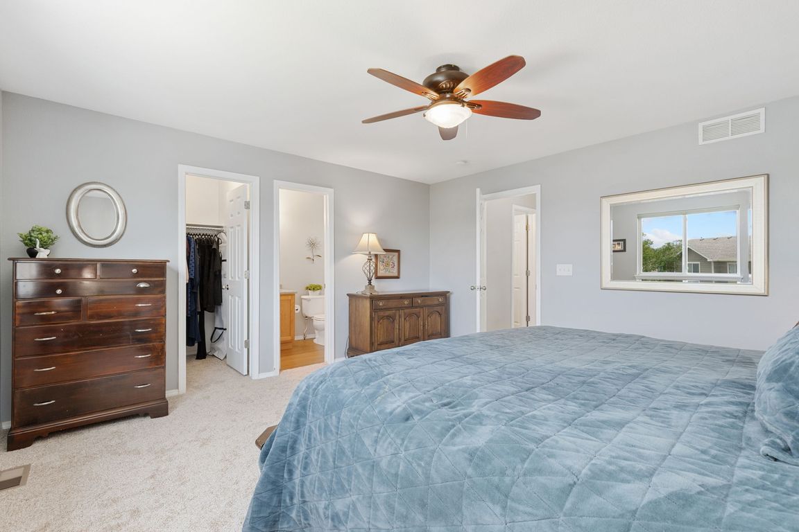 Primary bedroom en-suite wiht full bath and walk-in closet. Thoughtfully situated across the hall from the two secondary bedrooms.