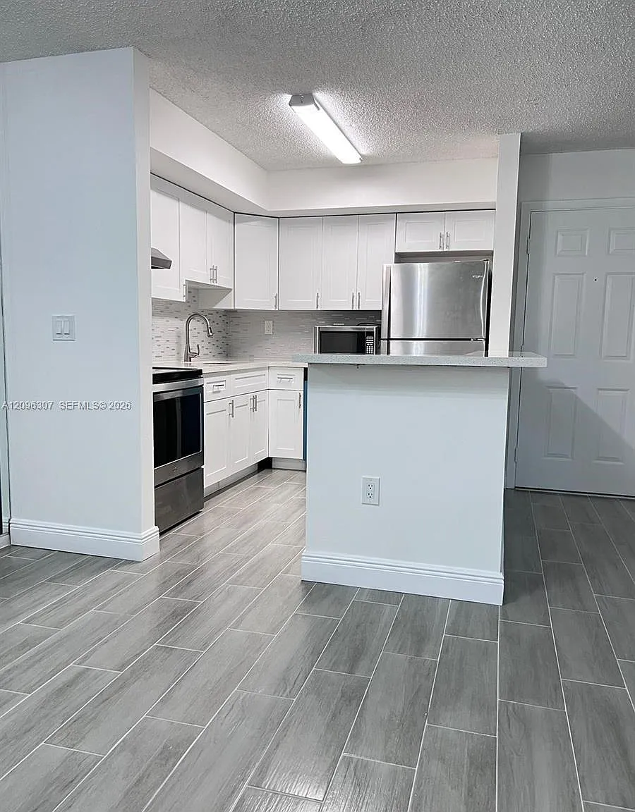 Countryside Village Condo — Photo 3