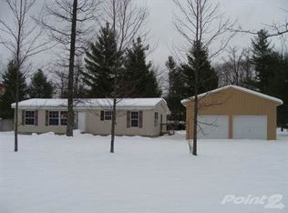 9228 Pine Circle Dr NW, Rapid City, MI 49676