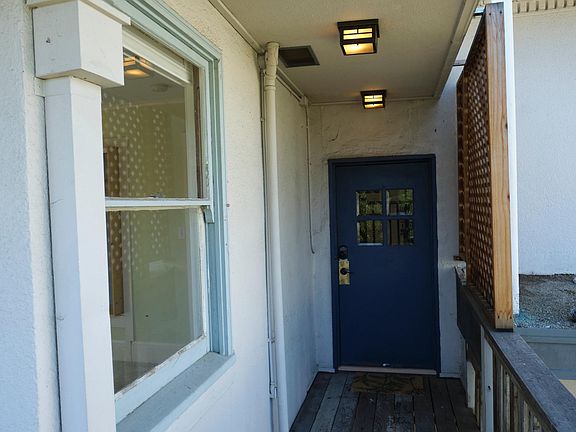 Upstairs entry way is sheltered from the elements.