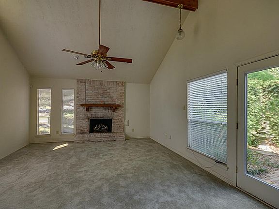 Nice living room with door to walled garden.