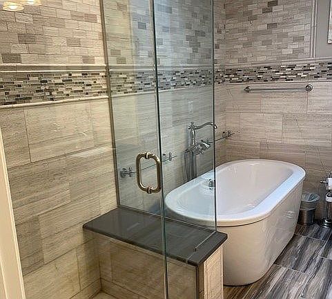 New tile, tub and shower.