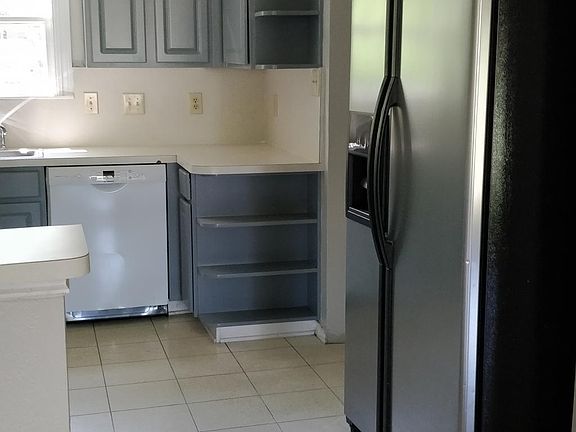 Kitchen - Includes refrigerator.