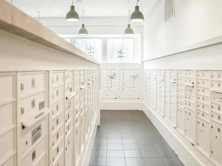 Secure On-Site Resident Mailroom with Individual Locked Mailboxes