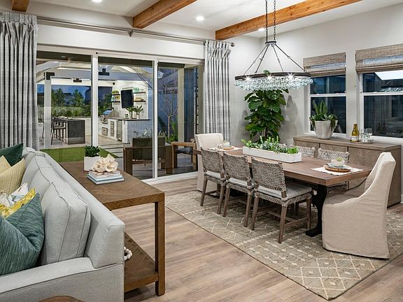 Casual dining space opens to large covered patio