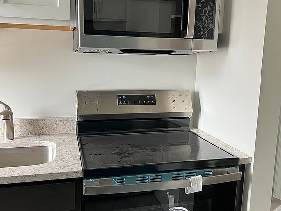 New kitchen with brand new appliances.