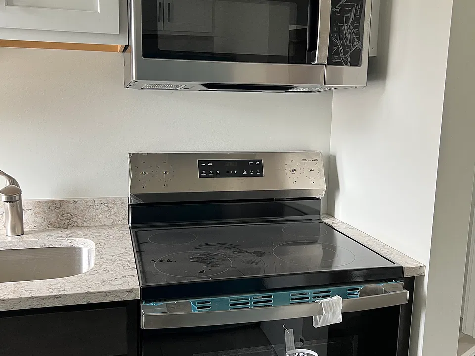 New kitchen with brand new appliances.