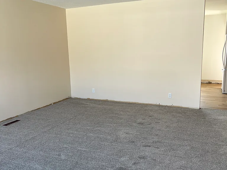 Living room - baseboards being installed this week.