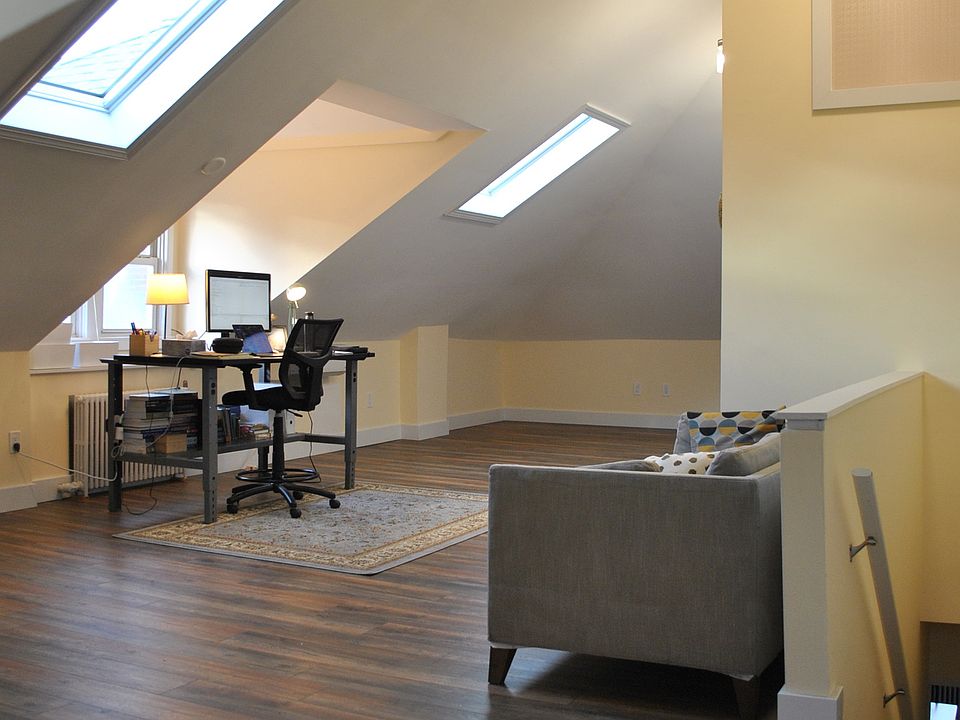 Spacious 3rd floor has room for bed and sofa along with desk. Bathroom on that floor makes it a great house share with a roomate.