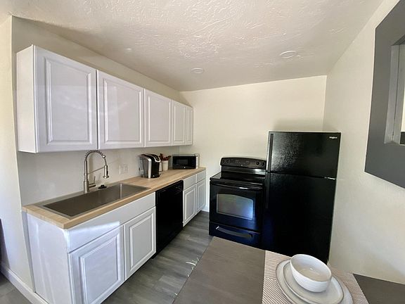 Kitchen: new cabinets, new farmhouse sink, new disposal, all new appliances (dishwasher, range, fridge, microwave)