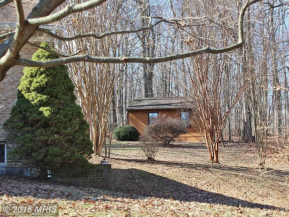 Detached garage and extensive landscaping
