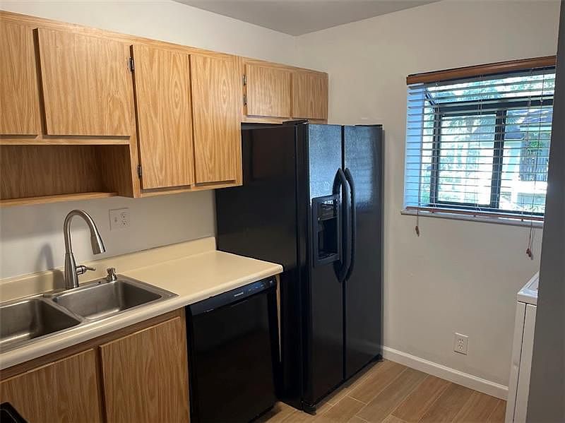1st image of 102 Gardens Dr APT 204