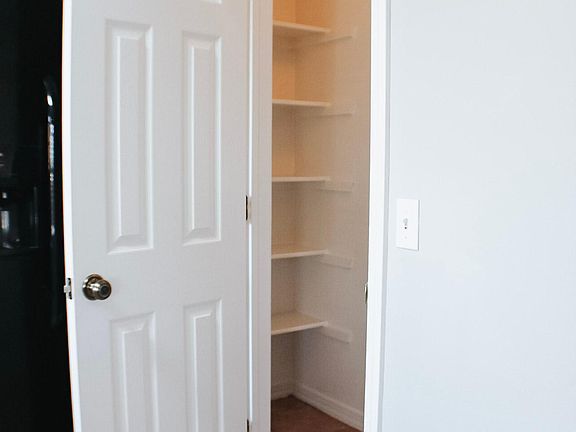 pantry with shelves on both sides