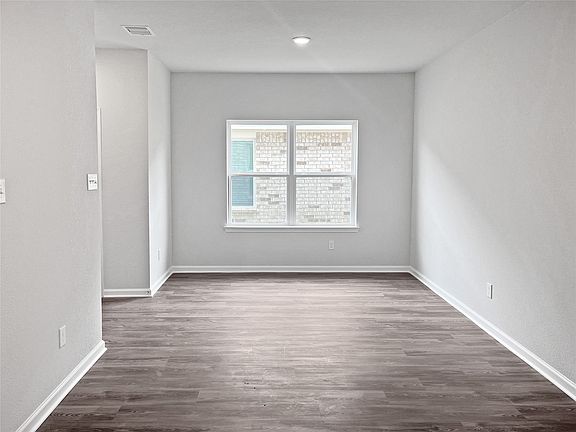 The Sparrow II- Dining Room. Home under construction. Sample floor plan photo used for illustrative