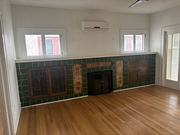 Main living room with built-in cabinets