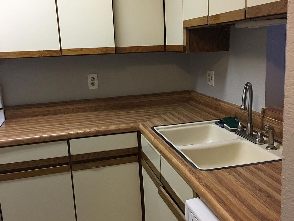 Kitchen with dishwasher, refrigerator, microwave, stove/oven