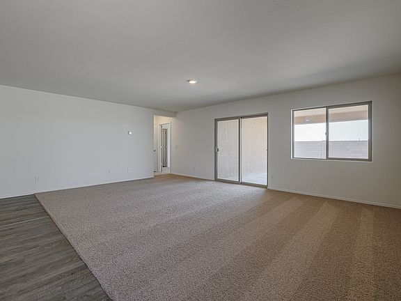 Spacious family room with space to entertain.