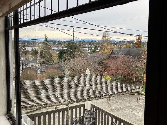 Above the house tops, full unobstructed views of territory, lake, and mountains.