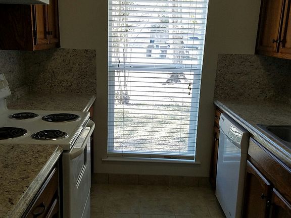 Kitchen with refrigerator