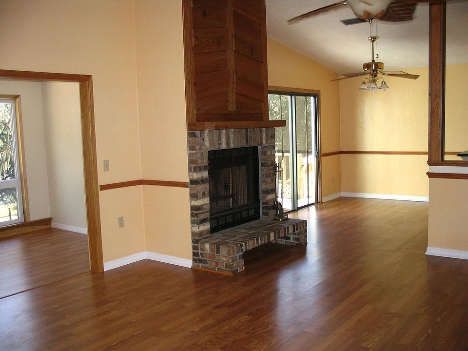 Living, Dining & Sunroom w/ fireplace